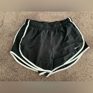black nike running shorts (M) w white pin stripes